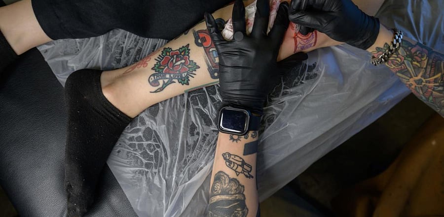While tattooing itself is not illegal, it is classed as a medical procedure and may only be carried out by a fully qualified doctor -- with the law setting a minimum two-year prison sentence for violators. Credit: AFP Photo