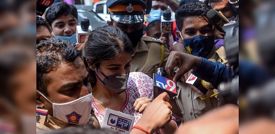 Bollywood actress Rhea Chakraborty (C) arrives at the Narcotics Control Bureau (NCB) office for enquiry regarding Sushant Singh Rajput case, in Mumbai on September 6, 2020. Credit: AFP Photo