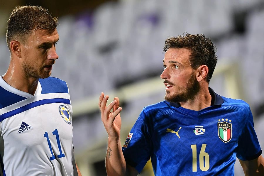 Italy's defender Alessandro Florenzi (R). Credit: AFP