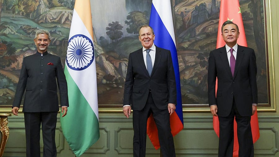 In this photo released by the Russian Foreign Ministry Press Service, India's Foreign Minister S. Jaishankar, left, Russia's Foreign Minister Sergey Lavrov, and China's Foreign Minister Wang Yi, pose for a photo on the sidelines of a meeting of Foreign Ministers of Shanghai Cooperation Organisation, Commonwealth of Independent States and Collective Security Treaty Organization Member States in Moscow. Credit: AP/PTI