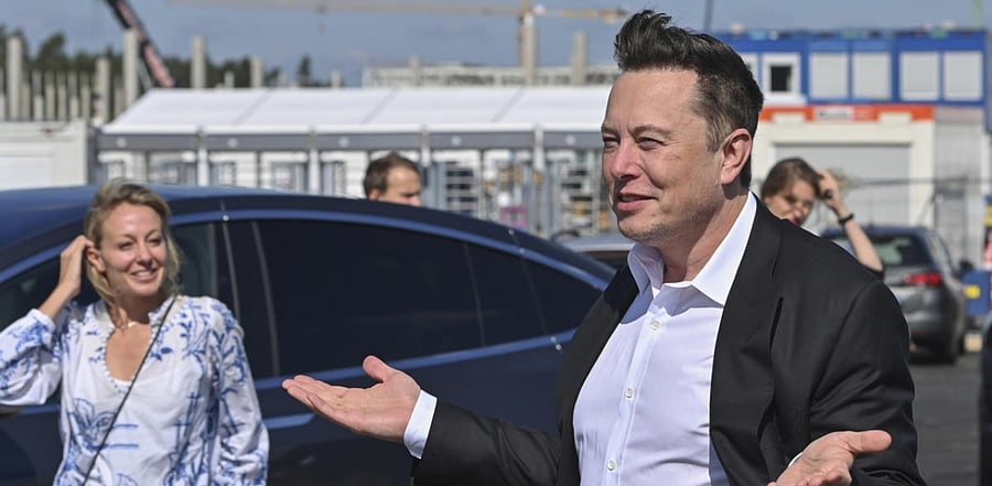 Technology entrepreneur Elon Musk arrives the Tesla Gigafactory construction site for a visit in Gruenheide near Berlin, Germany. Credit: AP