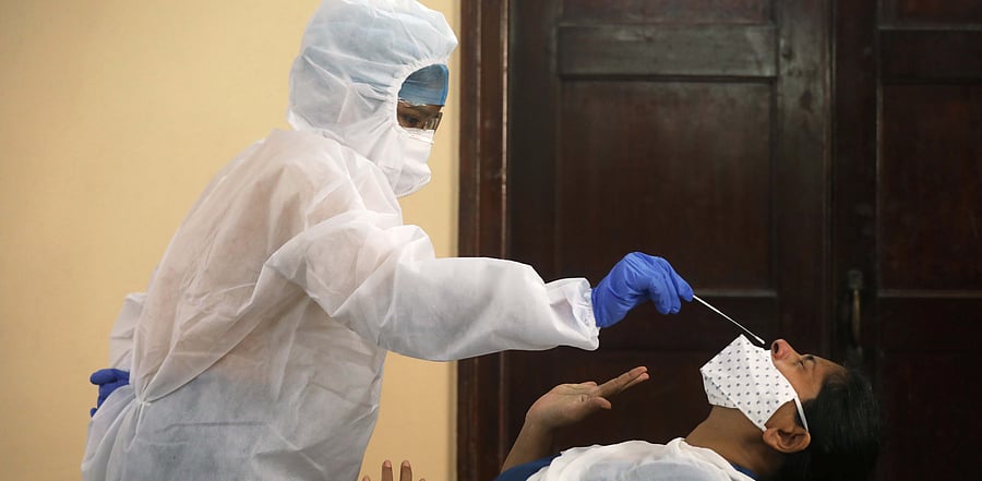 Health services need to target their response towards high-risk individuals, health care workers, elderly people with comorbidities and those going in for surgeries. Credit: Reuters photo