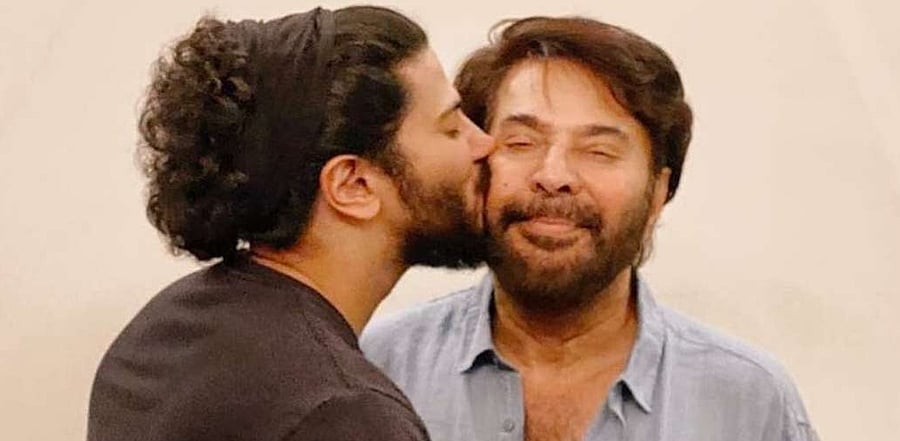An adorable photo of Dulquer Salmaan and Mammootty. Credit: Instagram/DulquerSalmaan