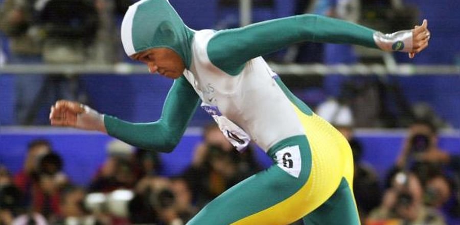 Cathy Freeman of Australia powering over the track in the 400m final at the Sydney Olympic Games in Sydney. Credit: AFP Photo