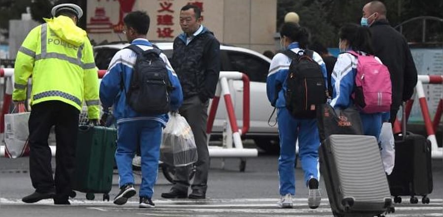 Students arriving at the Tongliao Mongolian Middle School in Tongliao in China's northern Inner Mongolia region, following recent protests over a new bilingual education policy by the Chinese government. Credit: AFP Photo