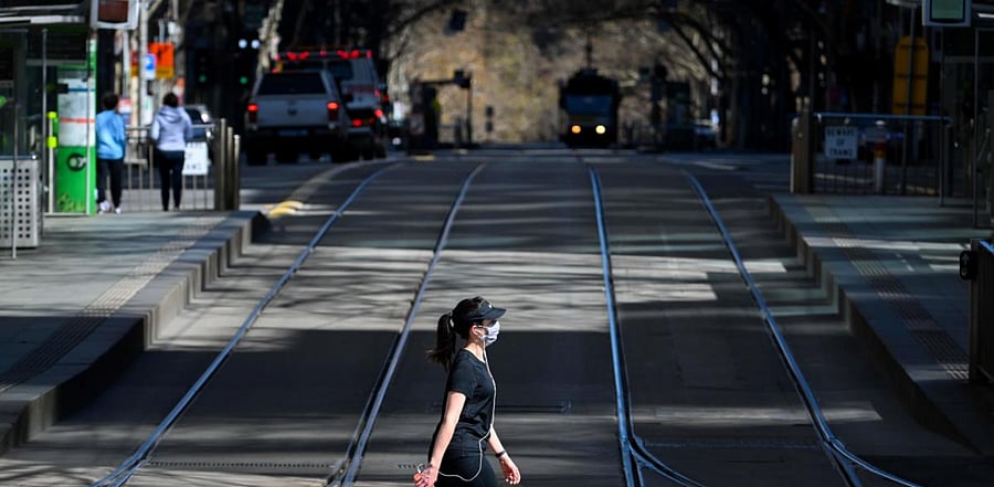 Average cases over the last two weeks in Melbourne, the state's largest city, fell below 50, health authorities said, within the target range for the state to ease more curbs. Credit: AFP Photo
