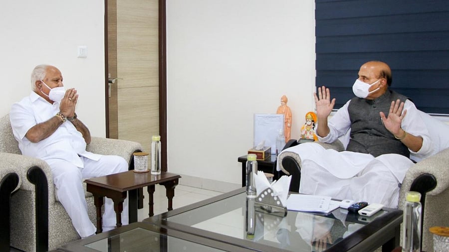 Karnataka Chief Minister B S Yediyurappa meets Defence Minister Rajnath Singh, in New Delhi. Credit: PTI.