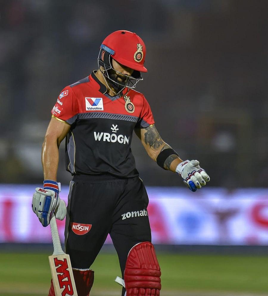 RCB batsman Virat Kohli returns upon his dismissal during the Indian Premier League (IPL T20 2019) cricket match between Royal Challengers Bangalore (RCB) and Rajasthan Royals( RR) at Sawai Man Singh stadium, in Jaipur, Tuesday, April 2, 2019. (PTI Photo)