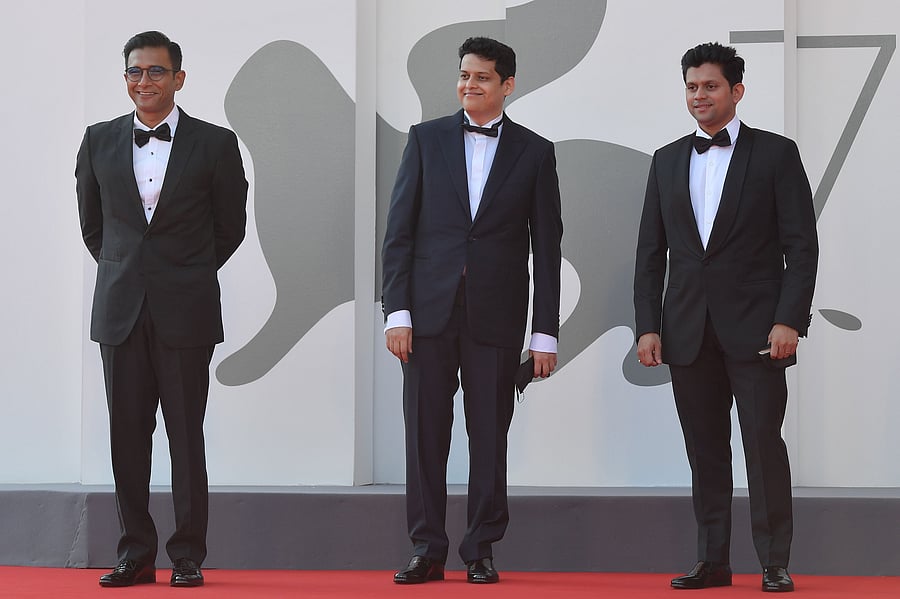 Producer Vivek Gomber, Chaitanya Tamhane and actor Aditya Modak at the screening of the film 'The Disciple' at the 77th Venice Film Festival, on September 4. AFP