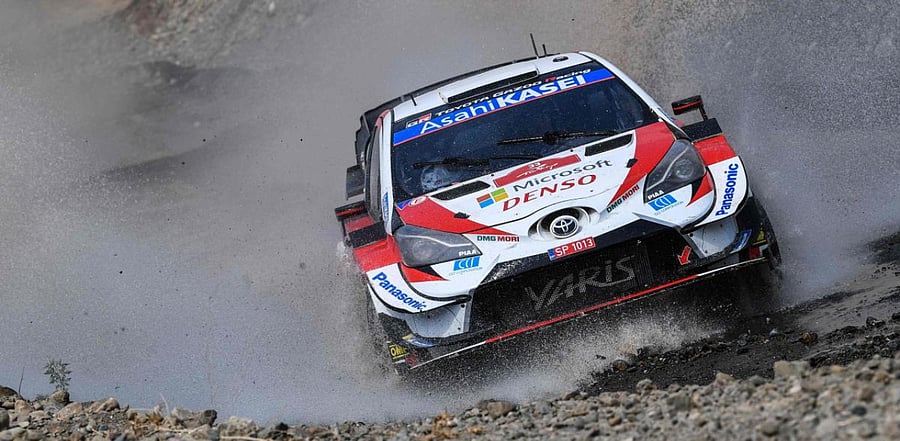 Elfyn Evans and co-driver Scott Martin steer their Toyota Yaris WRC racing car during the Marmaris stage on the third and last day of the Turkish WRC rally in Mugla. Credit: AFP Photo