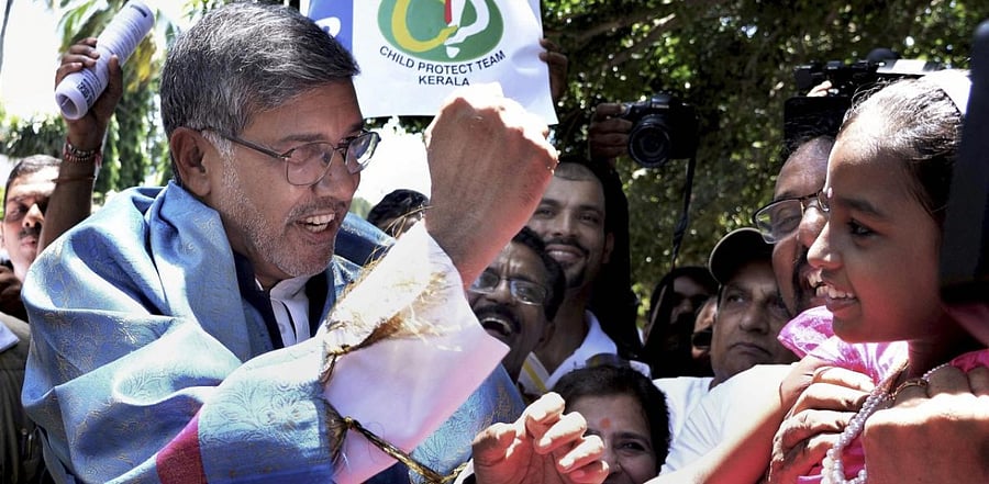 Nobel laureate Kailash Satyarthi interacting with children in Thiruvananthapuram. Credit: PTI Photo