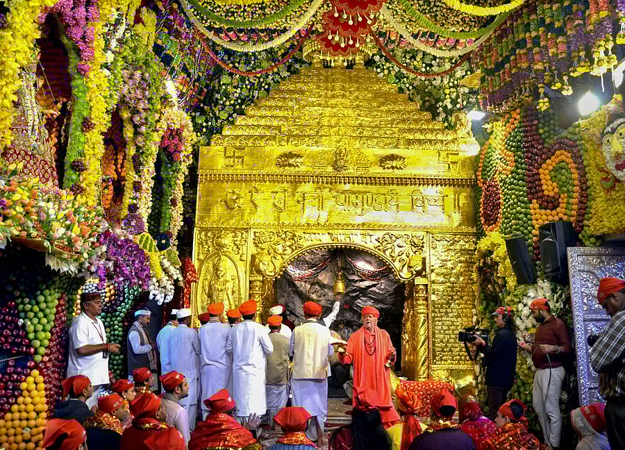 Devotees offer prayers at the holy cave shrine of Shri Mata Vaishno Devi. Credits: PTI Photo