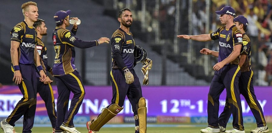Kolkata Knight Riders' captain Dinesh Karthik celebrates with his teammates during an IPL T20 cricket match. Credit: PTI