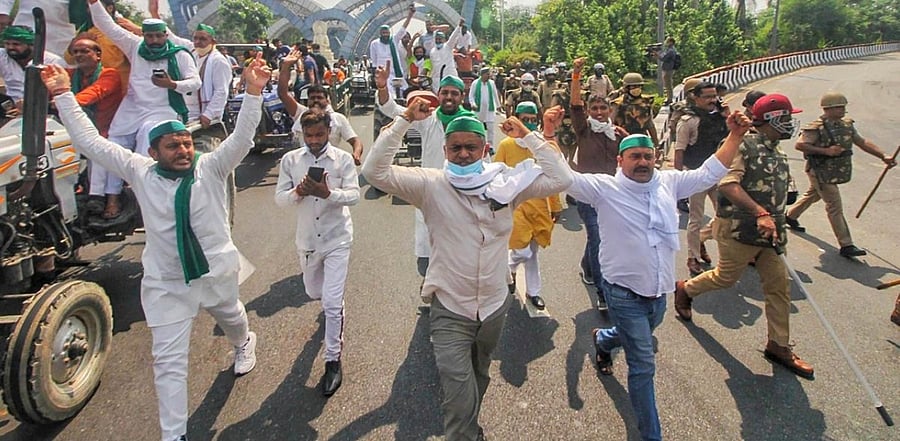 Farmers stage a protest at Delhi-Noida border over farm bills. Credit: PTI