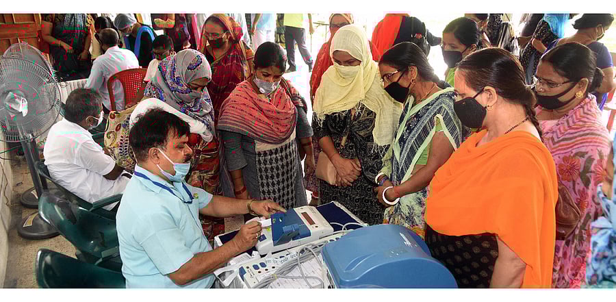 Election officers demonstrate the working of Electronic Voting Machine (EVM) and Voter-Verified Paper Audit Trail (VVPAT) during a training programme ahead of the state assembly polls. Representative image. Credit: PTI