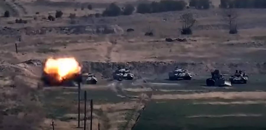 Azeri military vehicles during clashes between Armenian separatists and Azerbaijan in the breakaway region of Nagorno-Karabakh. Credit: AFP Photo