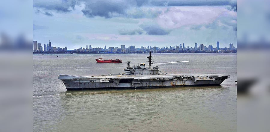 INS Viraat on its way to Alang in Gujarat, where it will be dismantled and sold as scrap, in Mumbai, Saturday, Sept. 19, 2020. The naval ship has served the Indian Navy for 30 years before being decommissioned three years ago. Credit: PTI Photo
