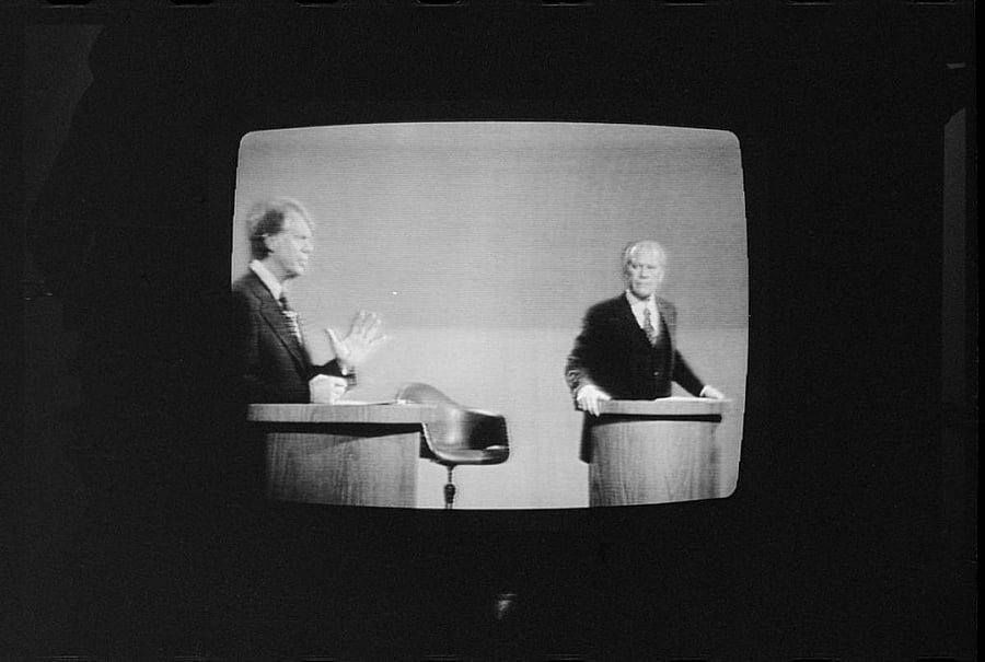 President Gerald Ford and Governor Jimmy Carter on television during the first presidential debate of the 1976. Credit: Reuters Photo