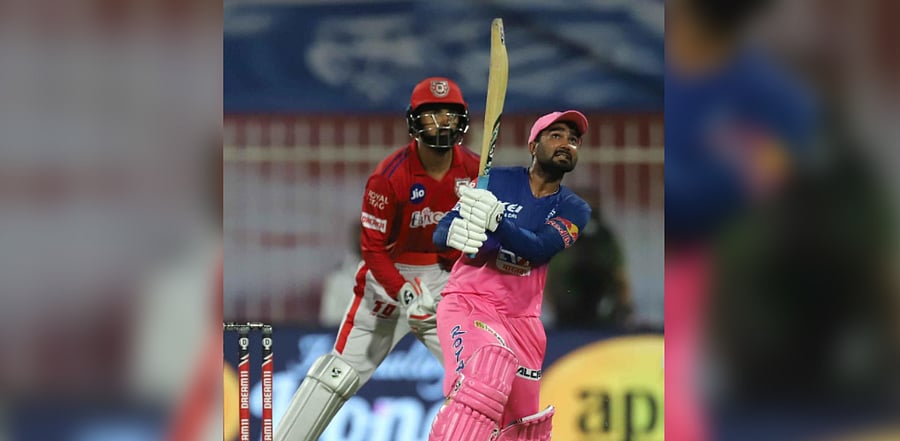 Rajasthan Royals batsman Rahul Tewatia plays a shot during the Indian Premier League 2020 cricket match against Kings XI Punjab, at Sharjah Cricket Stadium, Sharjah, Sunday, Sept. 27, 2020. Credit: PTI Photo