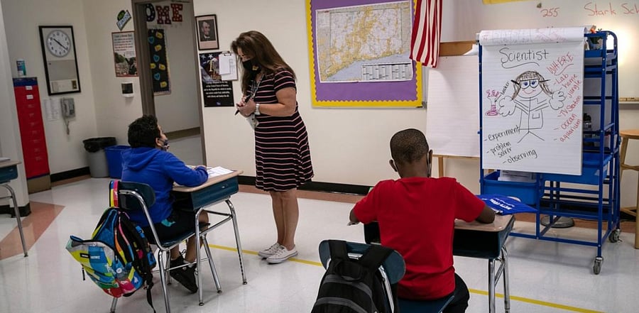 About 20 per cent of students in the school district, however, are enrolled in the distance learning option due to coronavirus concerns. Credit: AFP