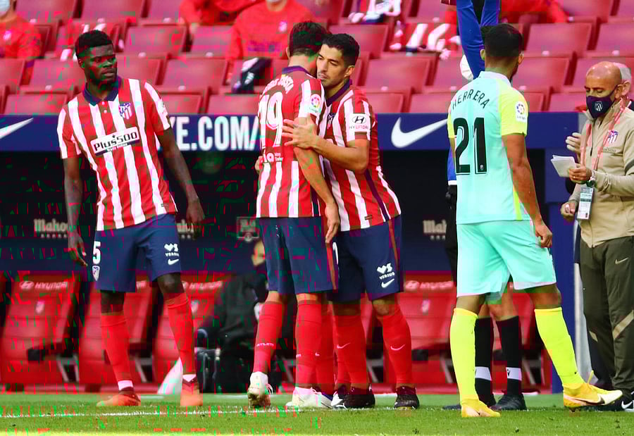 Atletico Madrid's Luis Suarez comes on as a substitute to replace Diego against Granada. Credit: Reuters