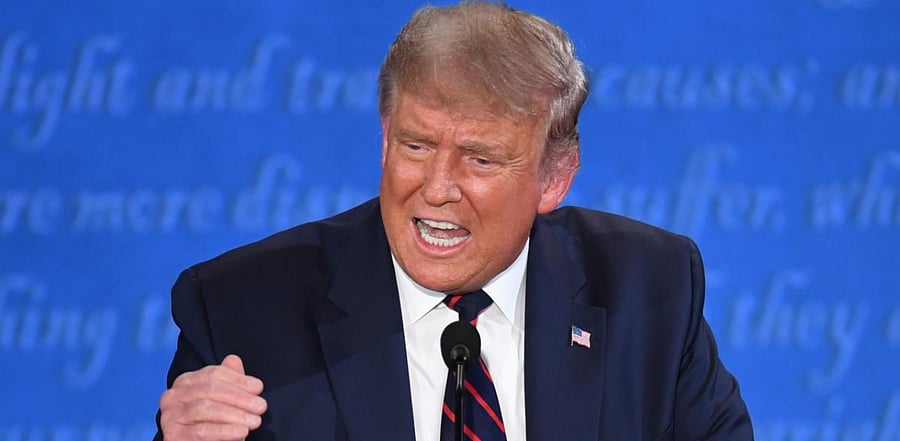 Trump, seizing on an answer Biden gave in a television interview earlier this year, said his Democratic opponent would close down the country in response to the coronavirus pandemic. Credit: AFP Photo