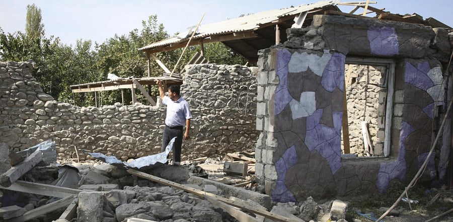 A view of an apartment building that was allegedly damaged by recent shelling during fighting over the breakaway region of Nagorno-Karabakh in Tartar region, Azerbaijan, Wednesday, Sept. 30, 2020. Credit: AFP Photo