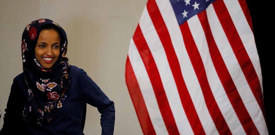 The video then claims that Democratic operatives connected to Omar’s campaign paid voters to hand over blank mail-in ballots and filled them out. Credit: Reuters