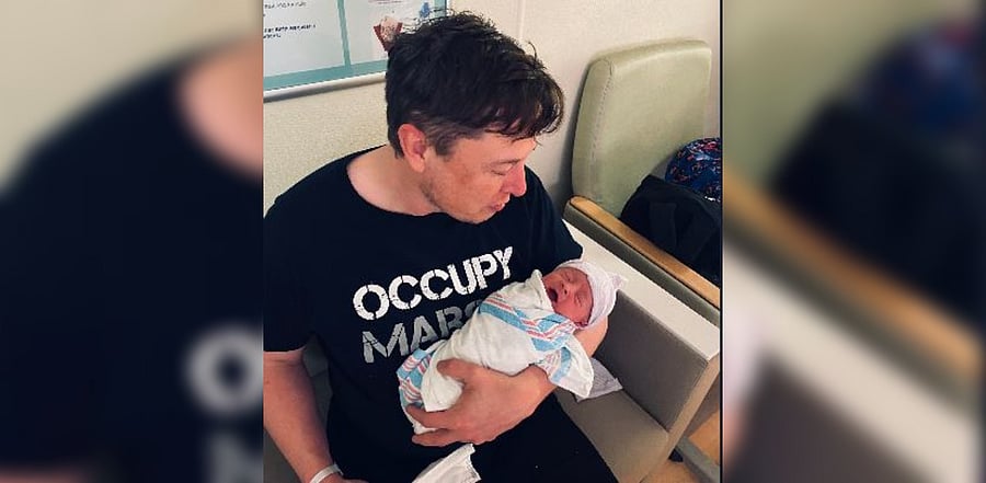Elon Musk with baby XÆA-Xii. Credit: Twitter/@elonmusk