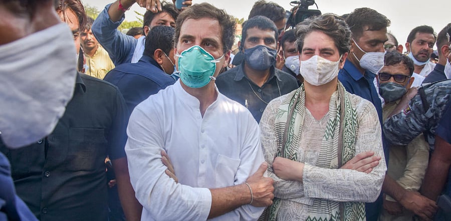 Rahul Gandhi with party General Secretary Priyanka Gandhi during his march to Hathras, on the Yamuna Expressway near Jewar. Credit: PTI Photo
