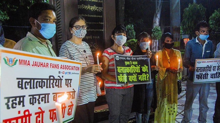 Members of MMA Jauhar Fans' Association during a protest over the death of a 19-year-old Dalit woman who was brutally gang-raped two weeks ago in Hathras, in Kanpur. Credit: PTI.