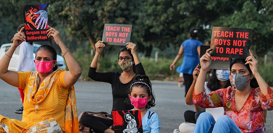 Members of various social organisations during a protest demanding justice for the Hathras victim. Credit: PTI Photo