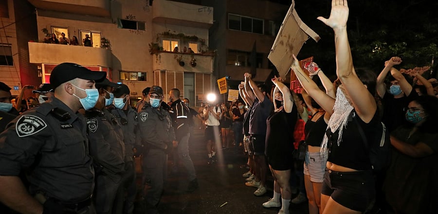 Israelis protest against legislation banning them from holding demonstrations more than 1 km (0.6 miles) from their homes, a measure the government said was aimed at curbing the coronavirus. Credit: Reuters Photo
