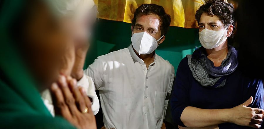 Congress leaders Priyanka Gandhi Vadra and Rahul Gandhi meet the family members of a 19-year-old Dalit woman who died after being allegedly raped two weeks ago, at Bulgadi village in Hathras. Credit: PTI Photo