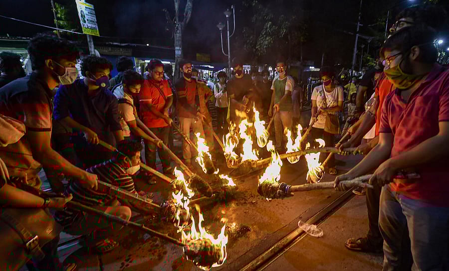 Students during a protest rally over the death of a 19-year-old Dalit woman who was allegedly gang-raped two weeks ago in Hathras (UP), in Kolkata, Monday, Oct. 5, 2020. Credit: PTI Photo