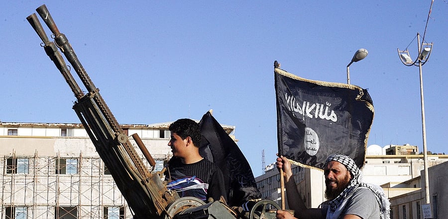 Seen from the West, they serve the same utopia: to impose Islamic law by violence throughout the world. But Al-Qaeda and the Islamic State (IS) group are also irreconcilable ideological adversaries and, on the ground, fratricidal enemies. Credit: AFP Photo