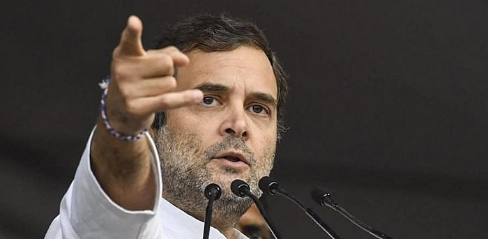 Rahul accused Modi of favouring a handful of corporates by handing out tax cuts to the tune of Rs 1.4 lakh crore, but not finding the money to pay state governments. Credit: PTI File Photo