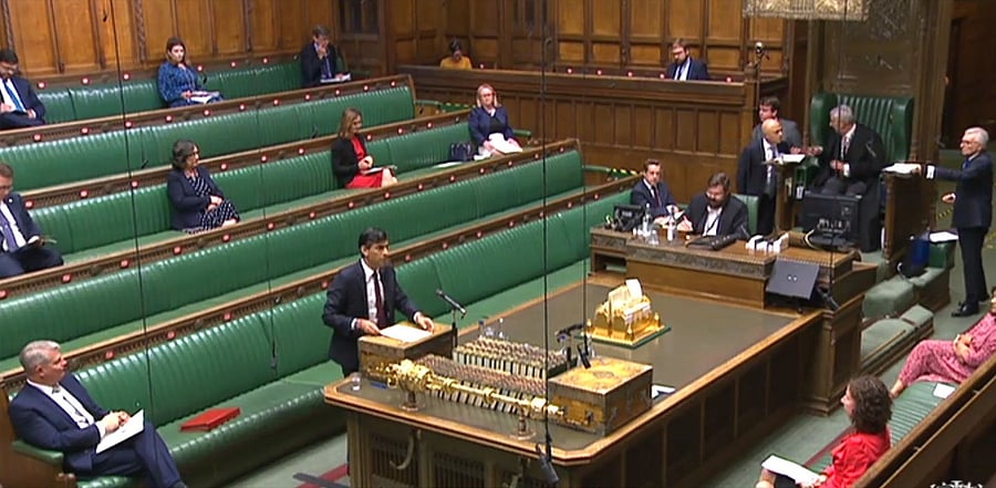 Britain's Chancellor of the Exchequer Rishi Sunak speaking as he presents his Winter Economy Plan in the House of Commons in London. Credit: AFP Photo