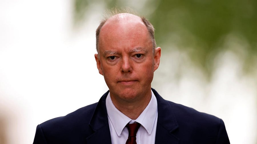 England's chief medical officer Chris Whitty said he was "not confident" the latest measures announced by Prime Minister Boris Johnson could reverse the upward trend. Credit: Reuters.