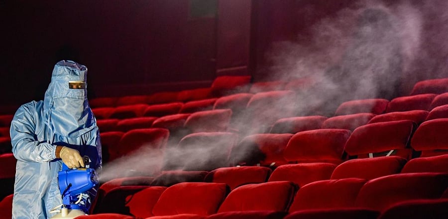 The Centre has permitted cinema halls and multiplexes to reopen with up to 50 per cent of their seating capacity, but it has left it to states to take a final call on granting the permission. Credit: PTI Photo