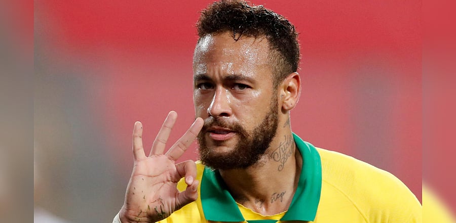  Brazil's Neymar celebrates scoring their fourth goal to complete his hat-trick. Credit: Reuters Photo