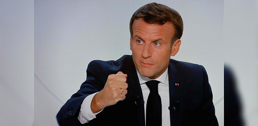 They came a day after French President Emmanuel Macron announced curfews in Paris and eight other French cities to deal with the rising toll of new infections. Credit: AFP Photo