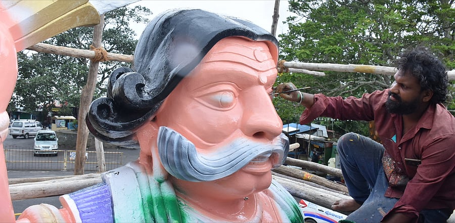 The statue of Mahishasura, atop the Chamundi Hill, in Mysuru, being given a fresh coat of paint, to celebrate Mahisha Dasara. Credit: DH Photo