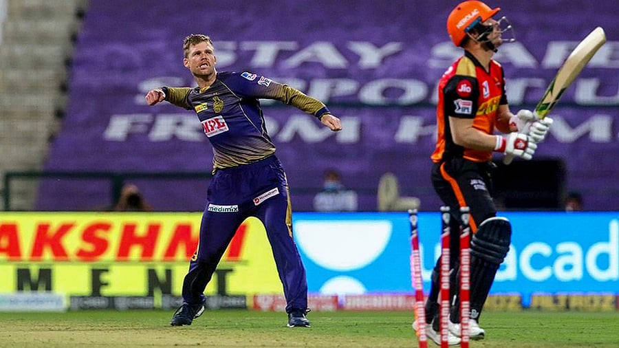 Kolkata Knight Riders (KKR) bowler Lockie Ferguson celebrates the wicket of Sunrisers Hyderabad (SRH) batsman David Warner. Credits: PTI Photo