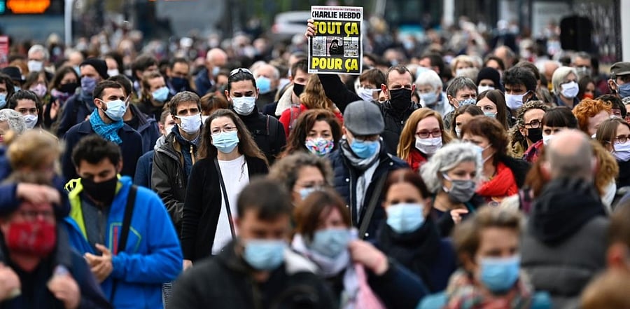 France protests beheading of teacher who showed Charlie Hebdo cartoons in school. Credit: AFP Photo