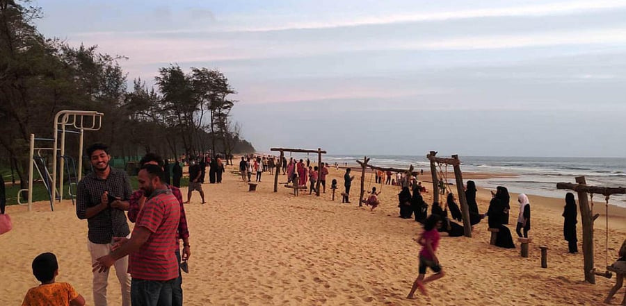 Visitors at Blue Flag-certified Padubidri Beach. Credit: DH Photo