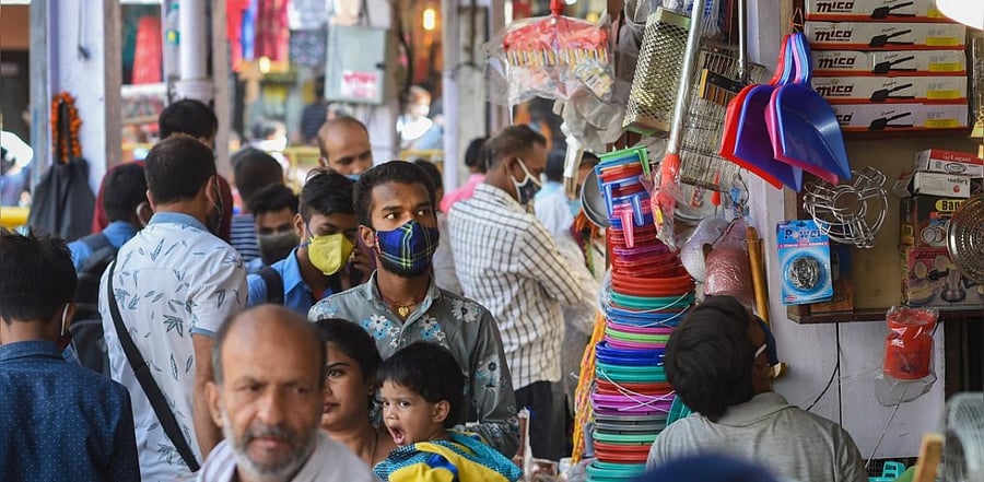 Crowded Chandni Chowk market during festive season, amid the ongoing coronavirus pandemic, in New Delhi, Monday, Oct. 19, 2020. Credit: PTI Photo