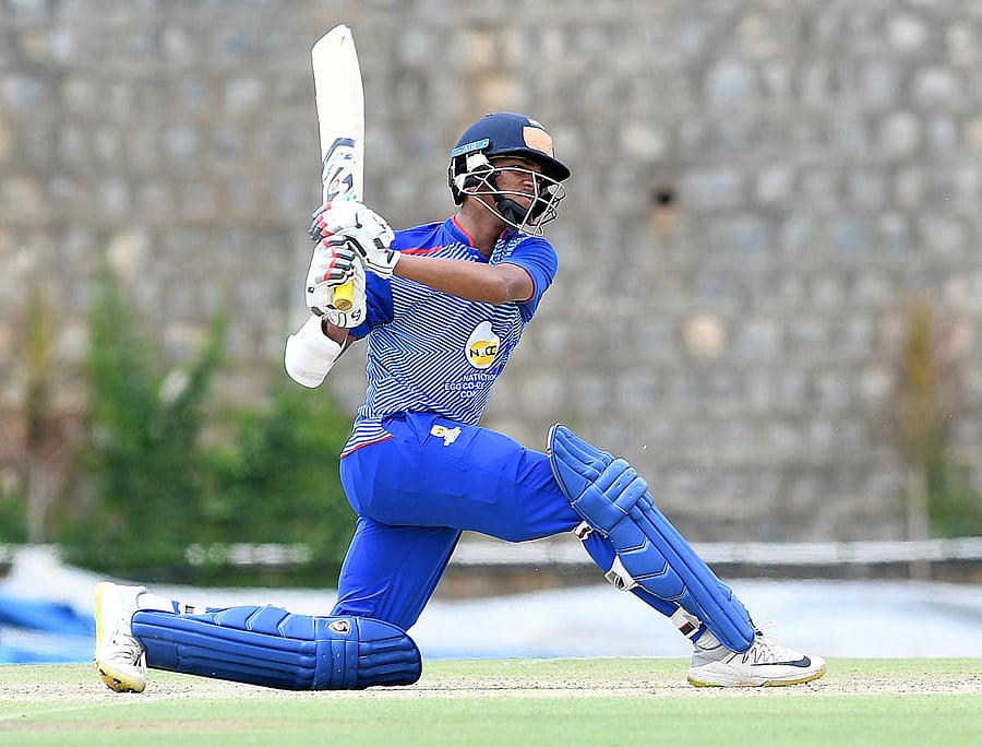 Yashasvi Jaiswal slams one to fence en route his double-century against Jharkhand. DH PHOTO/ SRIKANTA SHARMA R