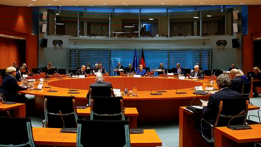 German Chancellor Angela Merkel, center, leads the weekly cabinet meeting of the government at the chancellery in Berlin. Credits: Reuters Photo