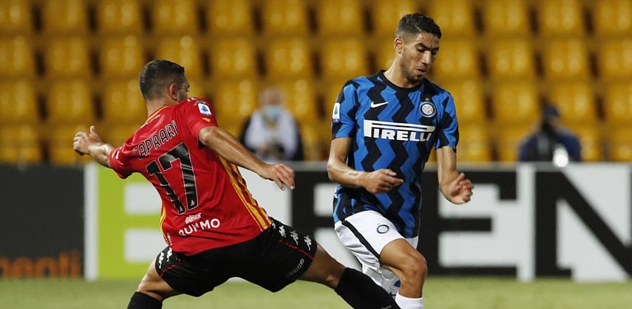Inter Milan's Achraf Hakimi in action with Benevento's Gianluca Caprari. Credit: Reuters